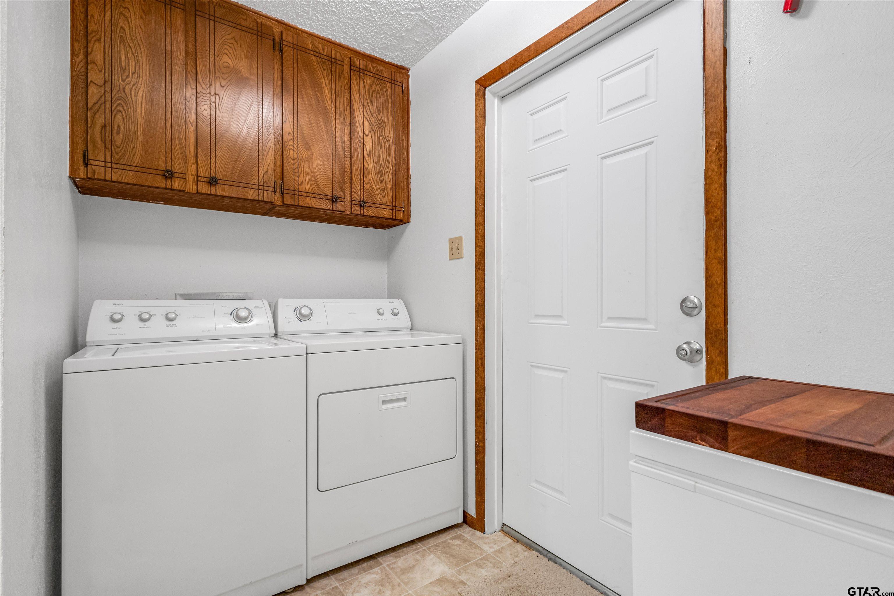 3702 E Highway Quitman, TX 75783 - Photo 16 of 33 a utility room with dryer and washer