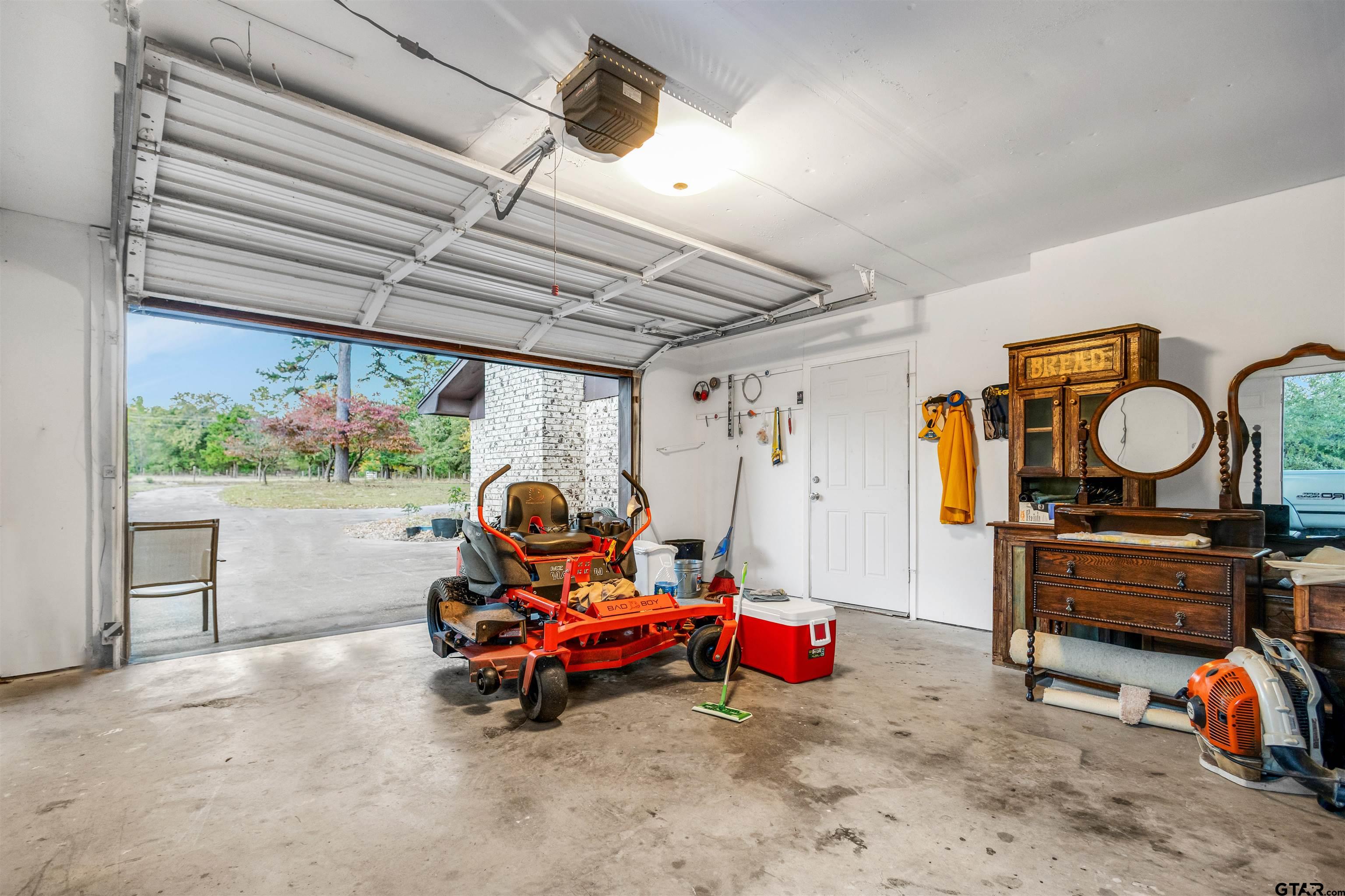 3702 E Highway Quitman, TX 75783 - Photo 17 of 33 a living room with furniture a air conditioner vent and a window