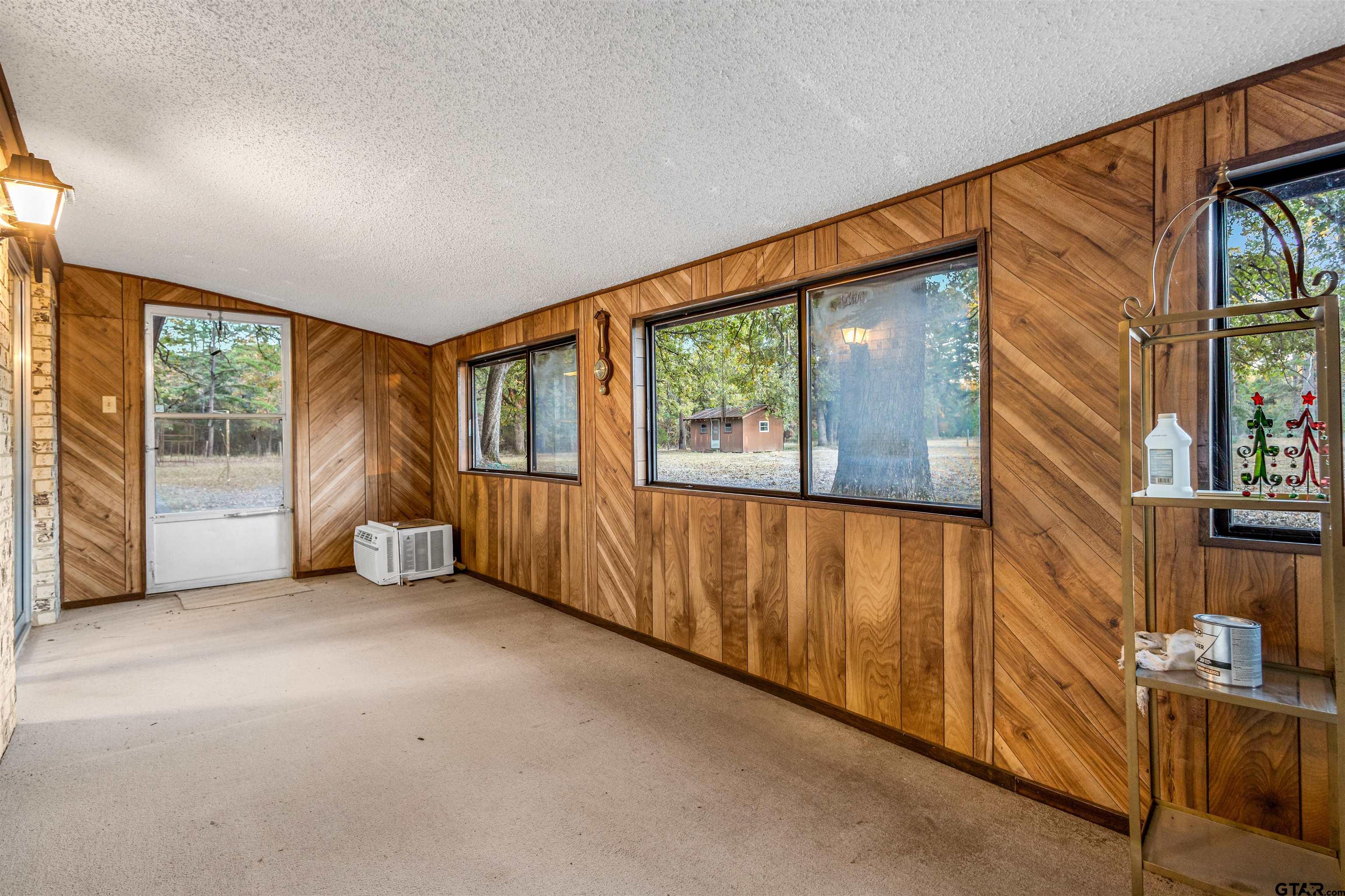 3702 E Highway Quitman, TX 75783 - Photo 18 of 33 a view of an empty room with a window