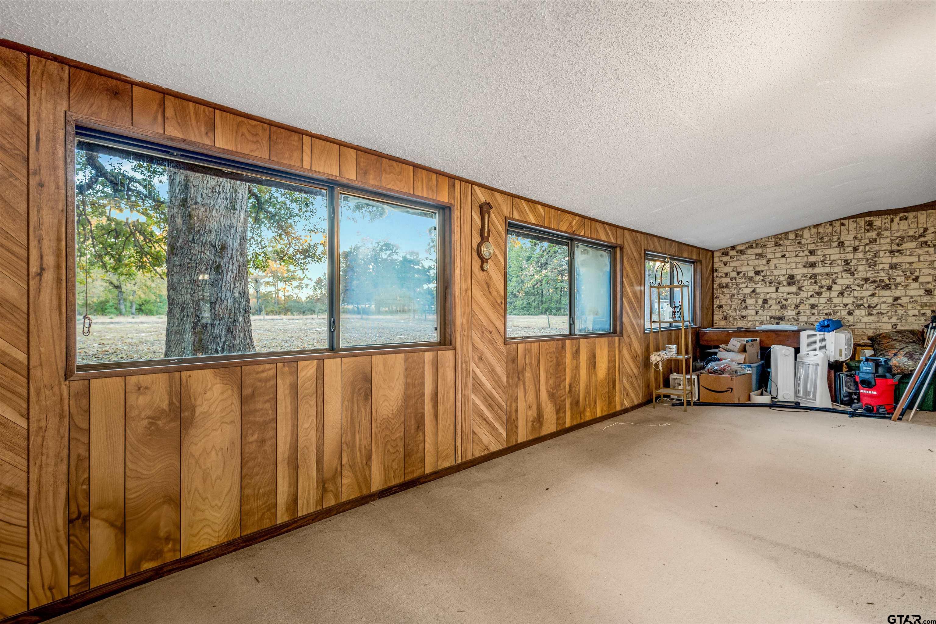 3702 E Highway Quitman, TX 75783 - Photo 19 of 33 a view of an empty room with furniture and windows