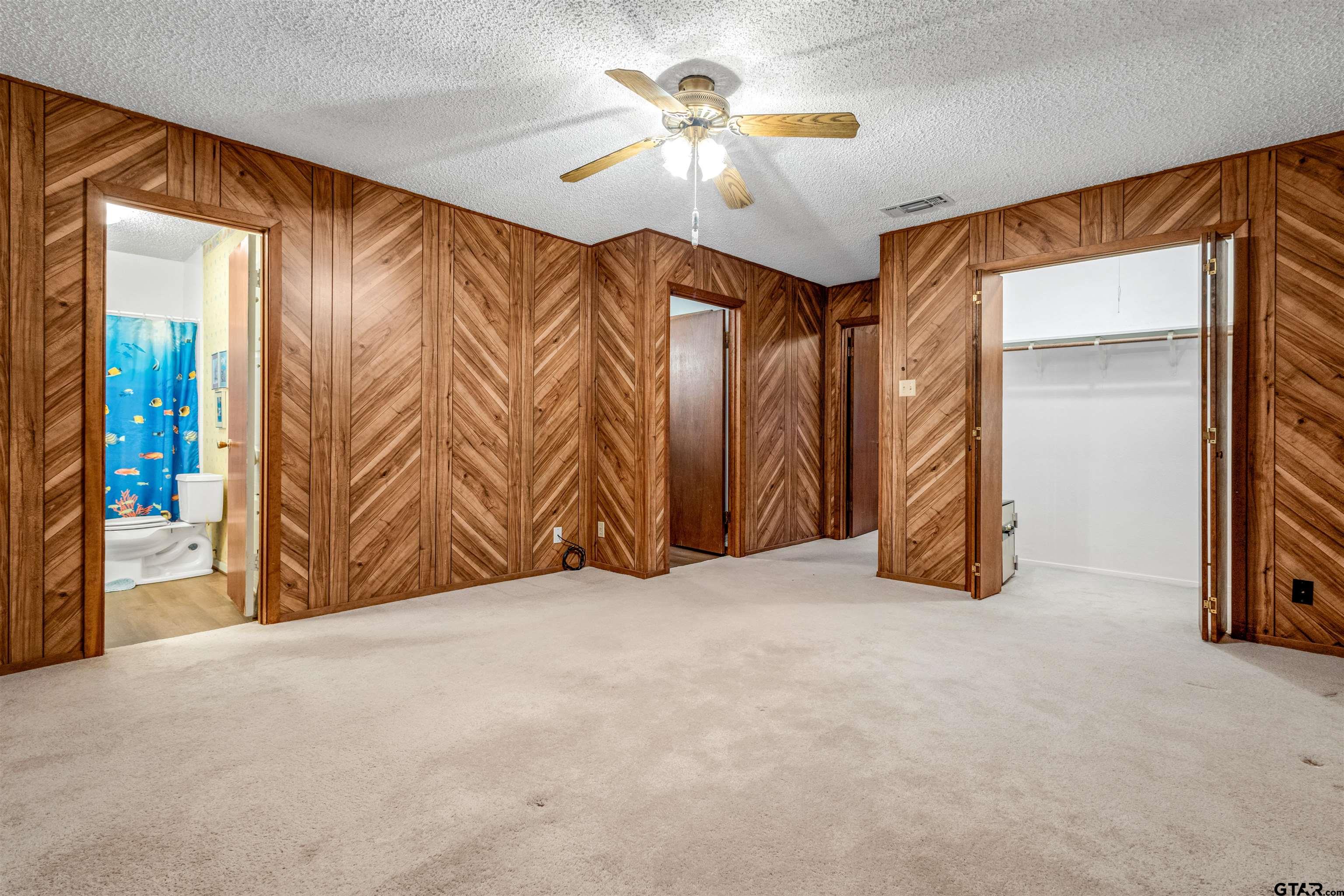 3702 E Highway Quitman, TX 75783 - Photo 28 of 33 a view of empty room with a ceiling fan and window
