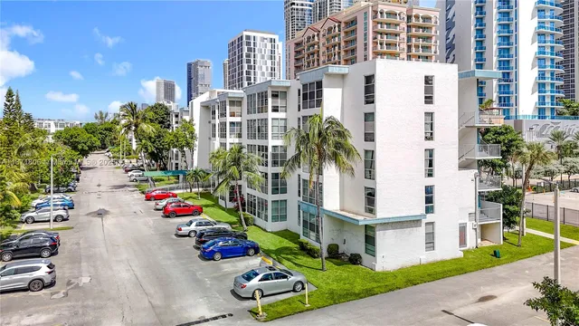 a view of a livingroom with an empty space and a window