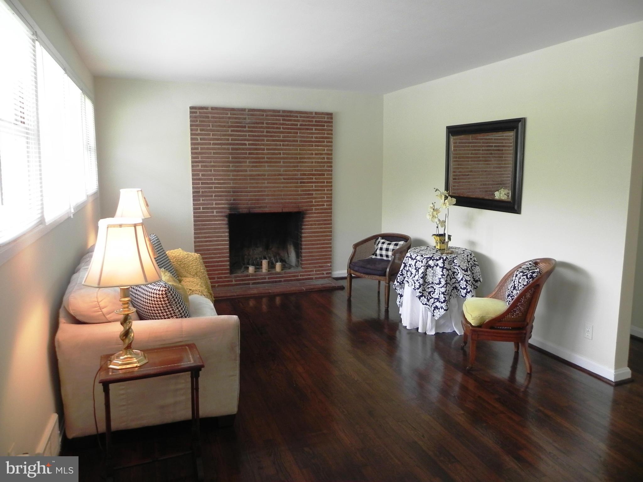 10212 Brunswick Avenue Silver Spring, MD 20902 - Photo 2 of 28 Living Room w/fireplace