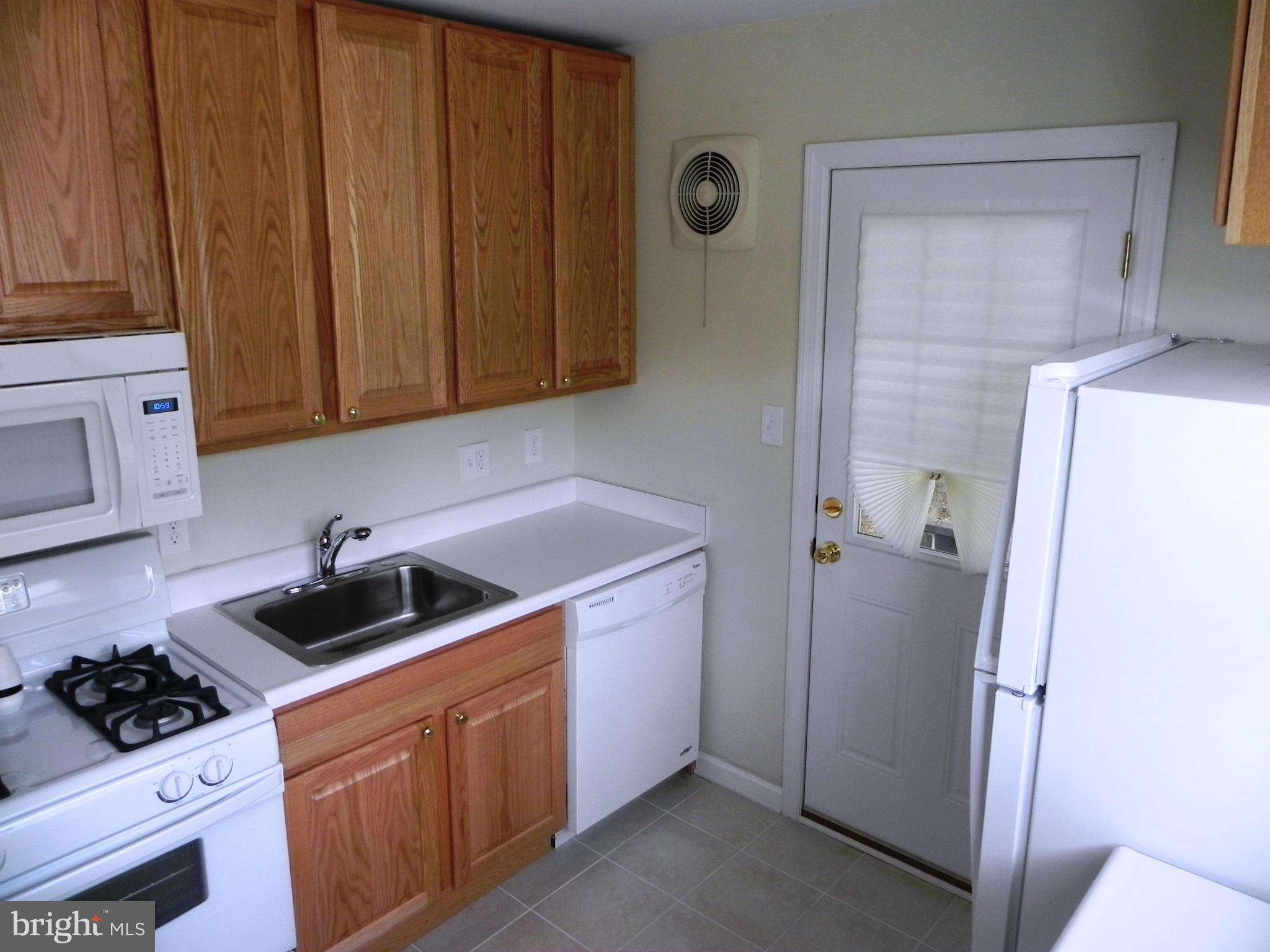 10212 Brunswick Avenue Silver Spring, MD 20902 - Photo 3 of 28 New kitchen