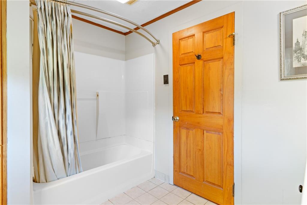 121 Jackson Street Harmony, PA 16037 - Photo 25 of 50 a bathroom with a shower and a tub