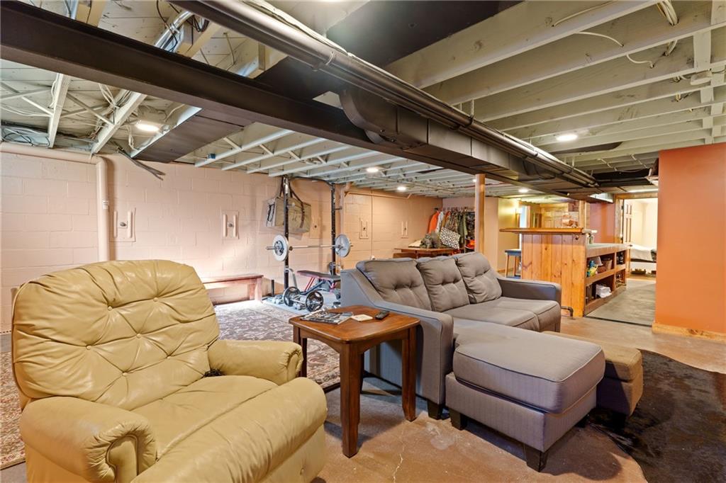 121 Jackson Street Harmony, PA 16037 - Photo 32 of 50 a living room with furniture and a table