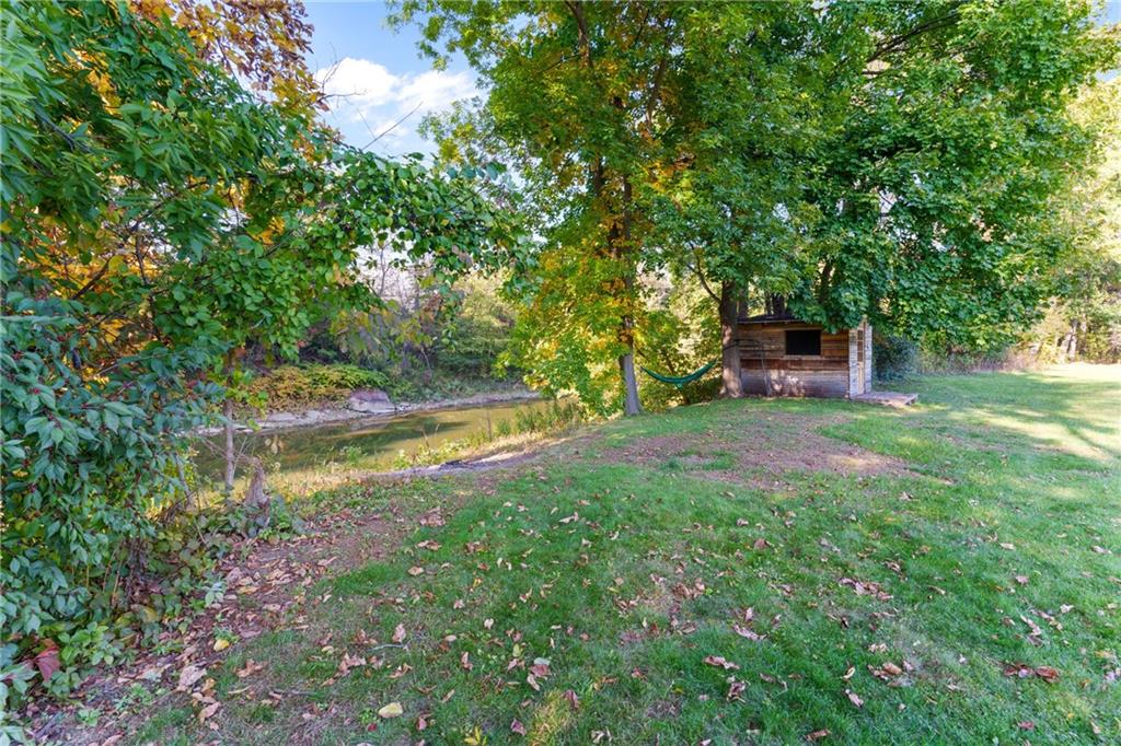 121 Jackson Street Harmony, PA 16037 - Photo 45 of 50 a view of a swimming pool with a yard