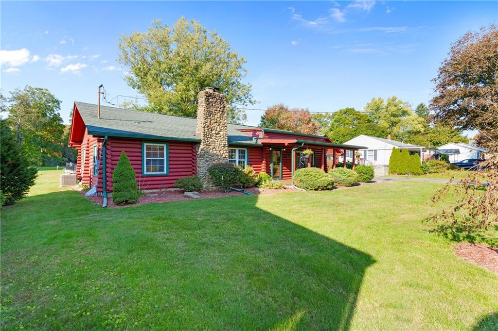 121 Jackson Street Harmony, PA 16037 - Photo 49 of 50 a front view of a house with yard and green space