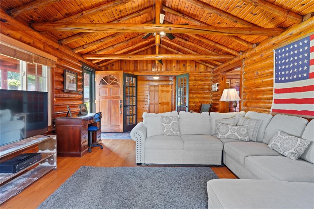 121 Jackson Street Harmony, PA 16037 - Photo 6 of 50 a living room with furniture and a flat screen tv