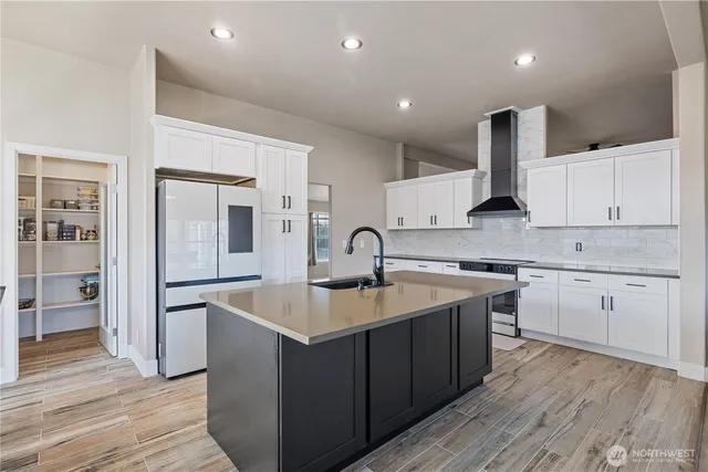 a kitchen with cabinets and sink