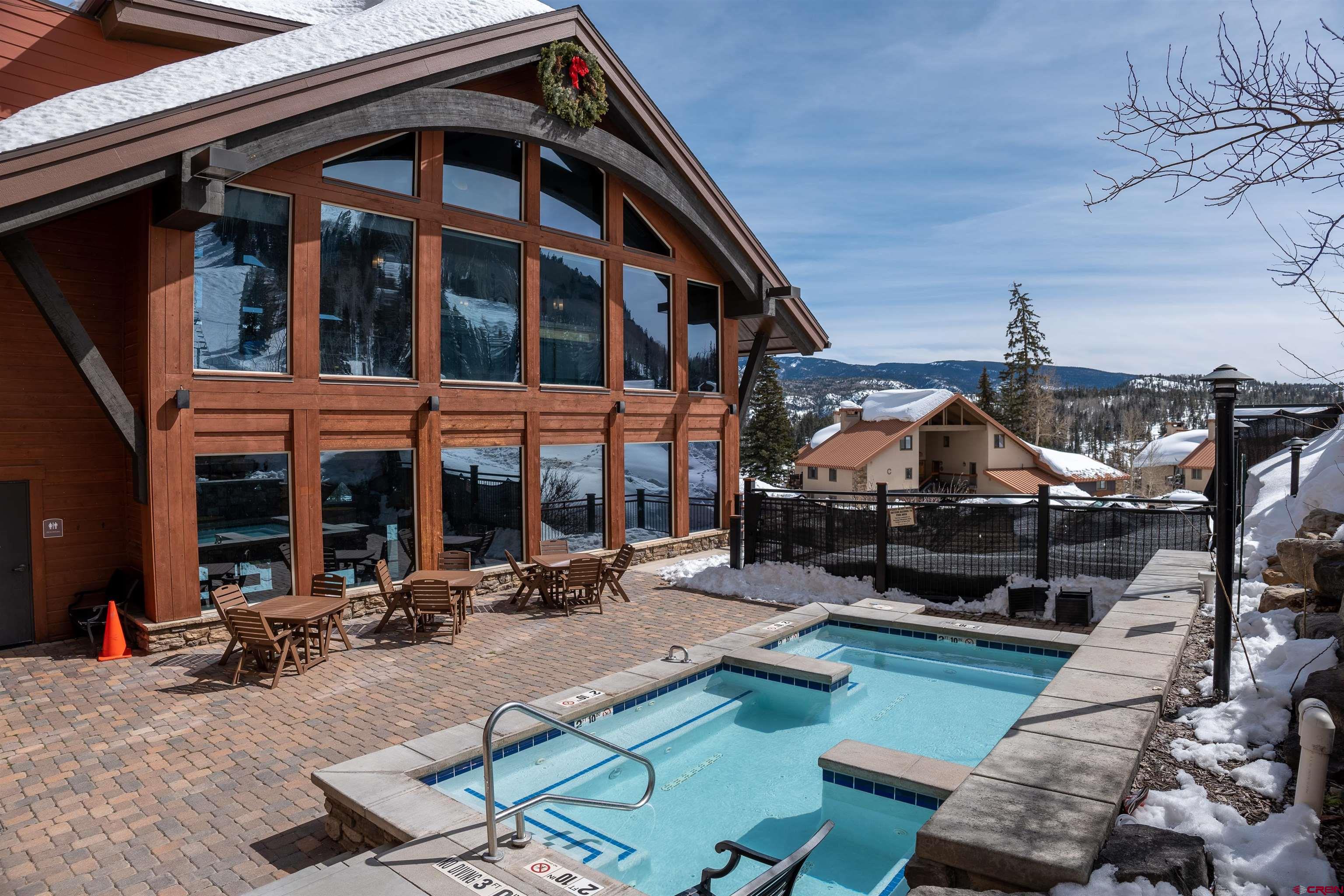 117 Needles Way, Unit 528 Durango, CO 81301 - Photo 12 of 41 a view of a building with sitting area