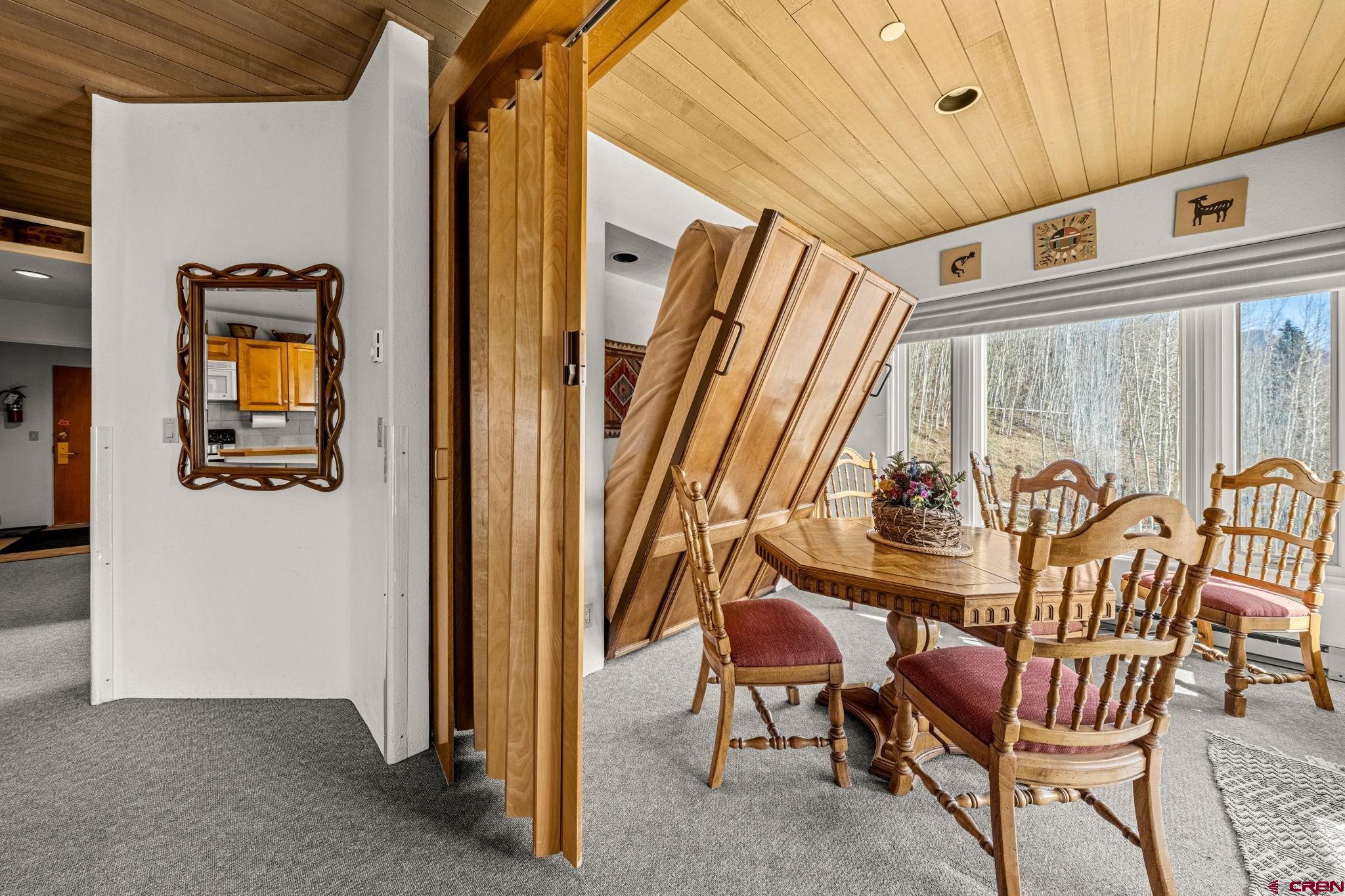 117 Needles Way, Unit 528 Durango, CO 81301 - Photo 17 of 41 a view of a dining room with chairs