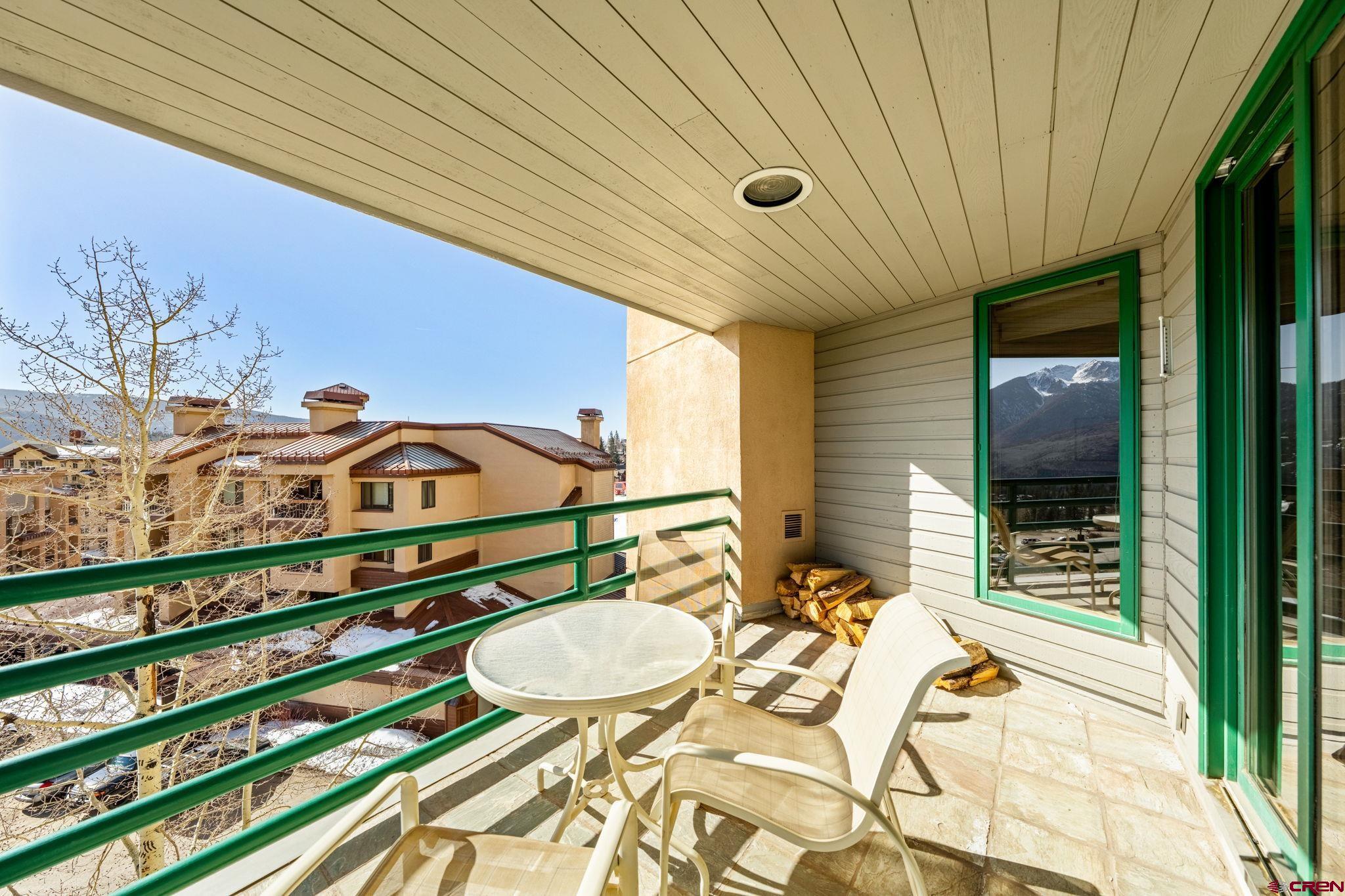 117 Needles Way, Unit 528 Durango, CO 81301 - Photo 23 of 41 a view of a chairs and table in the balcony