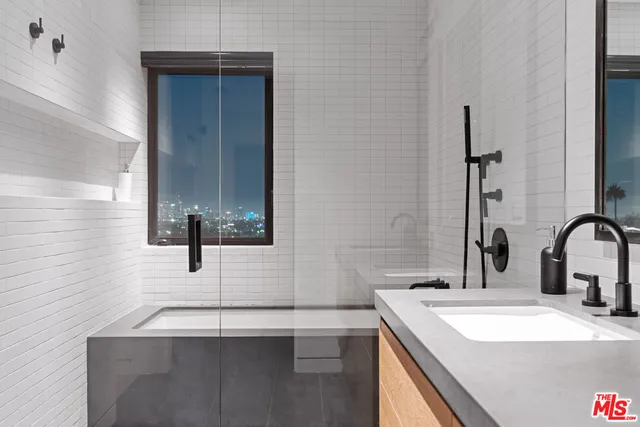 a view of swimming pool with outdoor seating