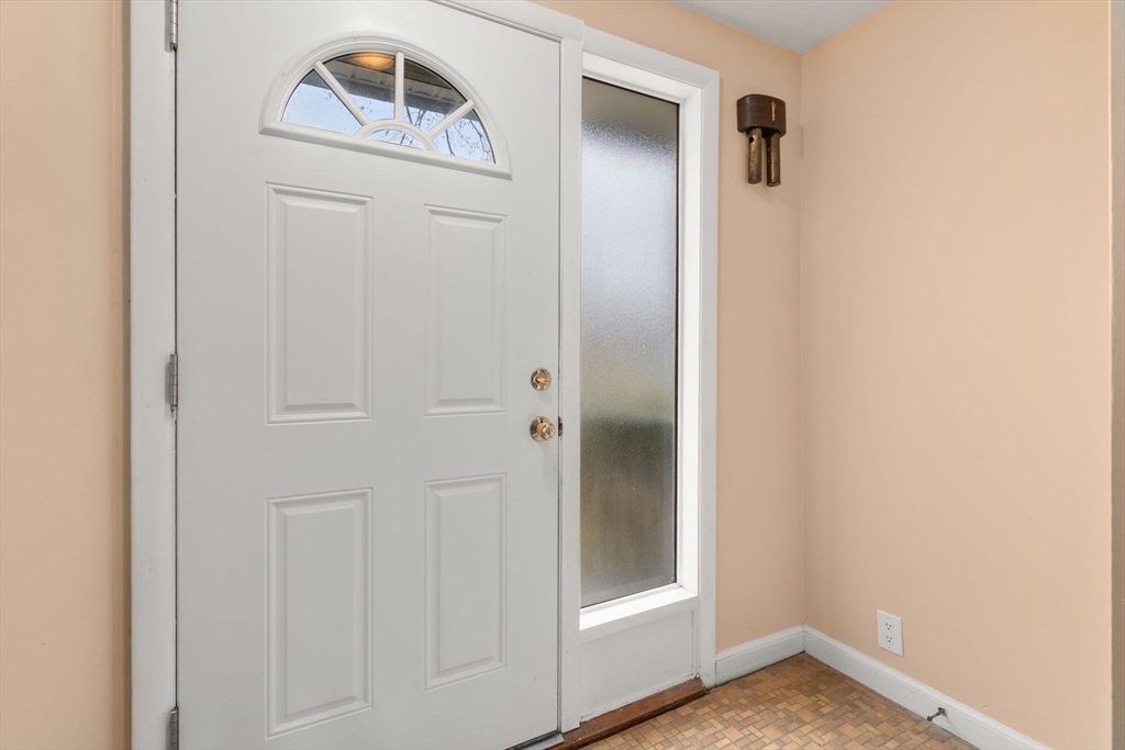 18 Royce Road Framingham, MA 01701 - Photo 13 of 30 a view of a hallway with front door