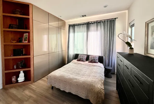 a view of an empty room with shelves