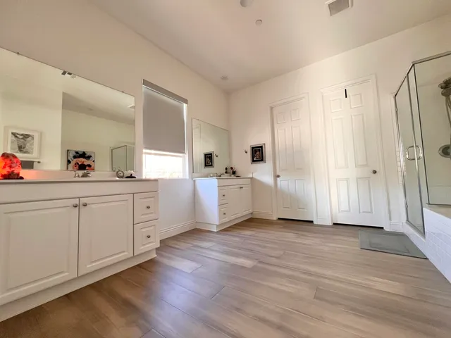a bathroom with a bathtub and a sink