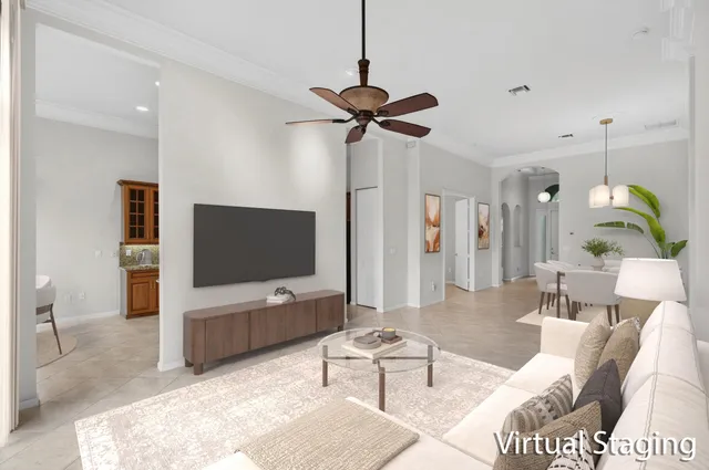 a kitchen with stainless steel appliances granite countertop a refrigerator a sink dishwasher stove and oven