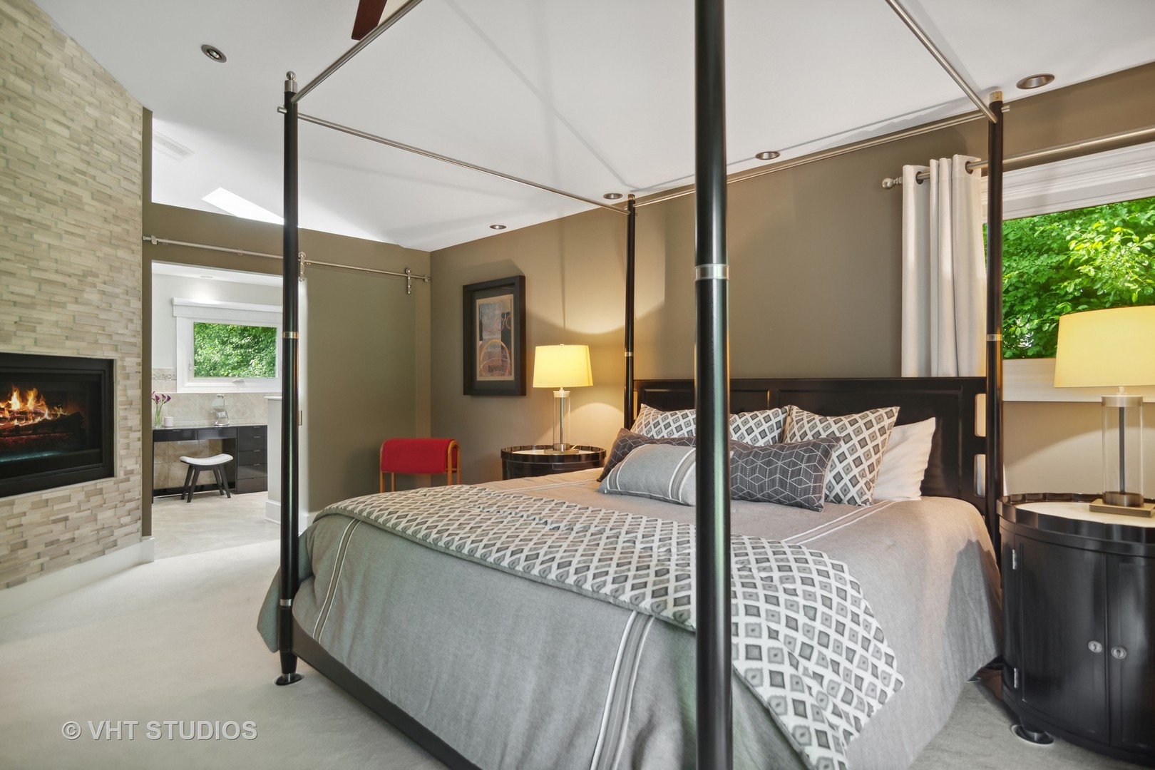 359 Haman Road Inverness, IL 60067 - Photo 14 of 39 a bedroom with a large bed and a chandelier