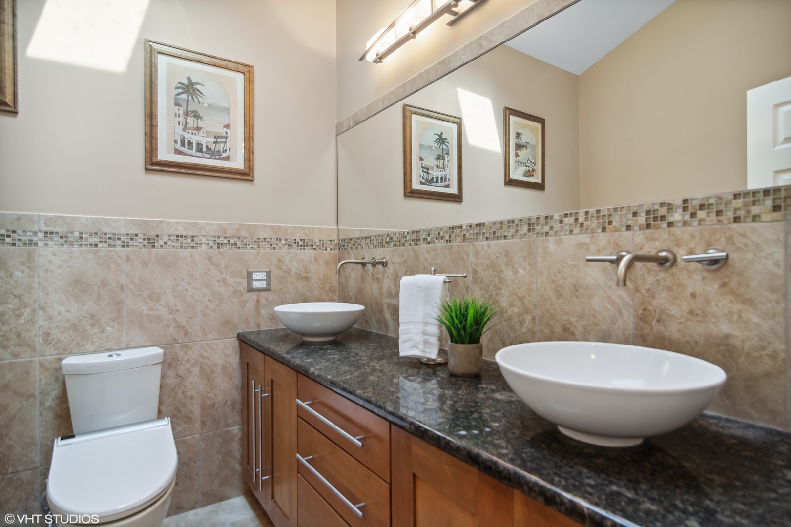 359 Haman Road Inverness, IL 60067 - Photo 17 of 39 a bathroom with a granite countertop toilet sink and mirror