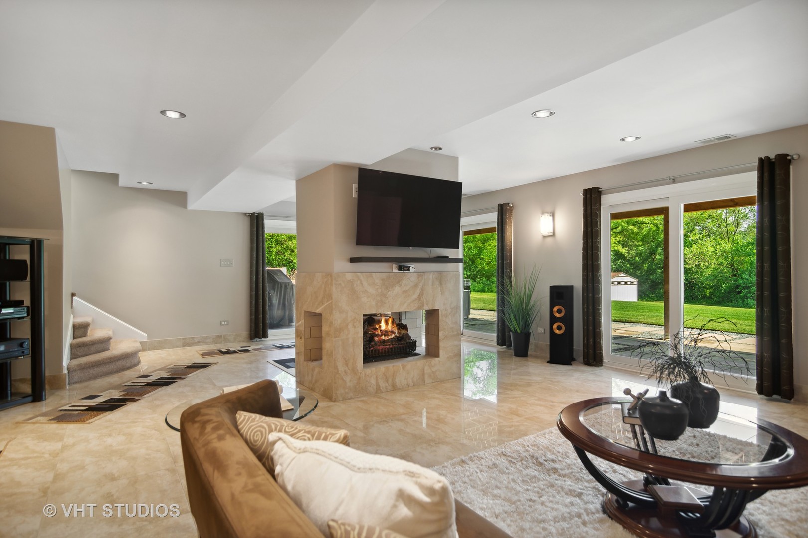 359 Haman Road Inverness, IL 60067 - Photo 25 of 39 a living room with fireplace furniture and a large window