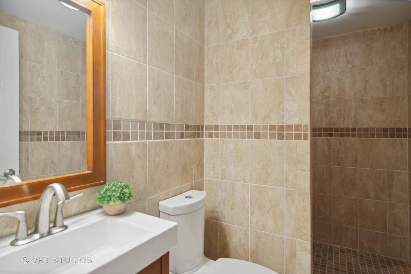 359 Haman Road Inverness, IL 60067 - Photo 28 of 39 a bathroom with a sink toilet and shower