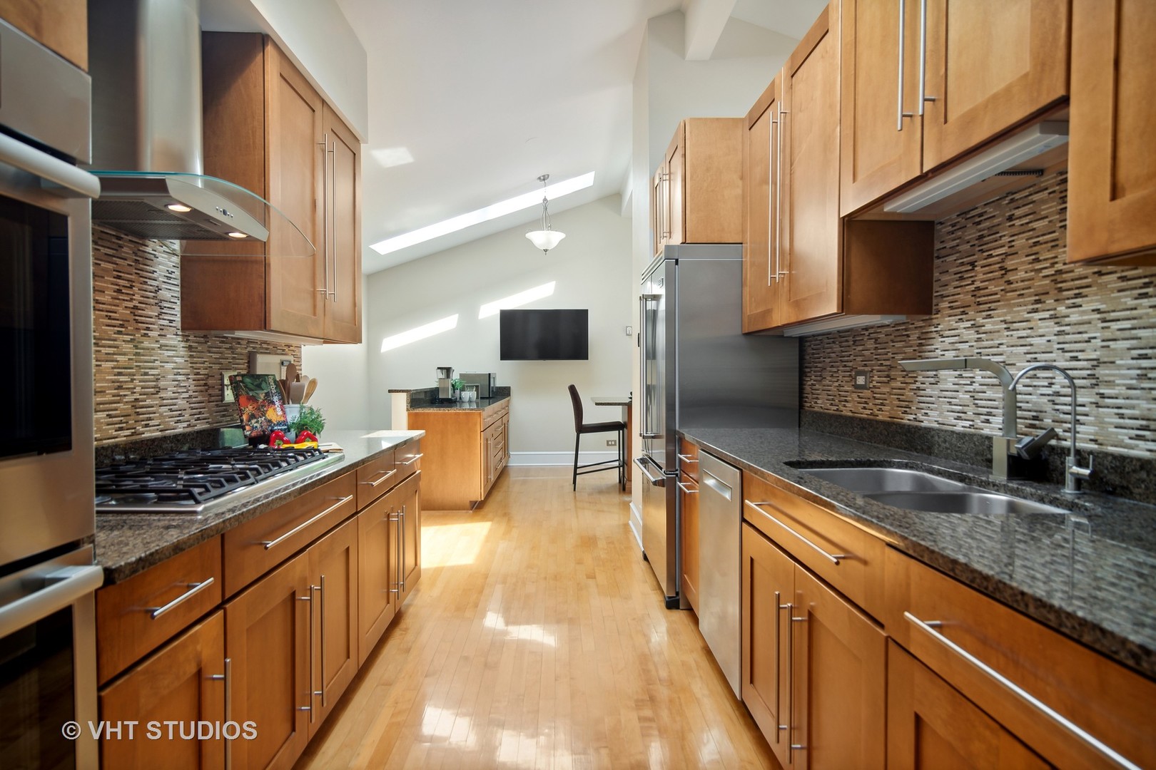 359 Haman Road Inverness, IL 60067 - Photo 8 of 39 a kitchen with stainless steel appliances a sink a stove and cabinets