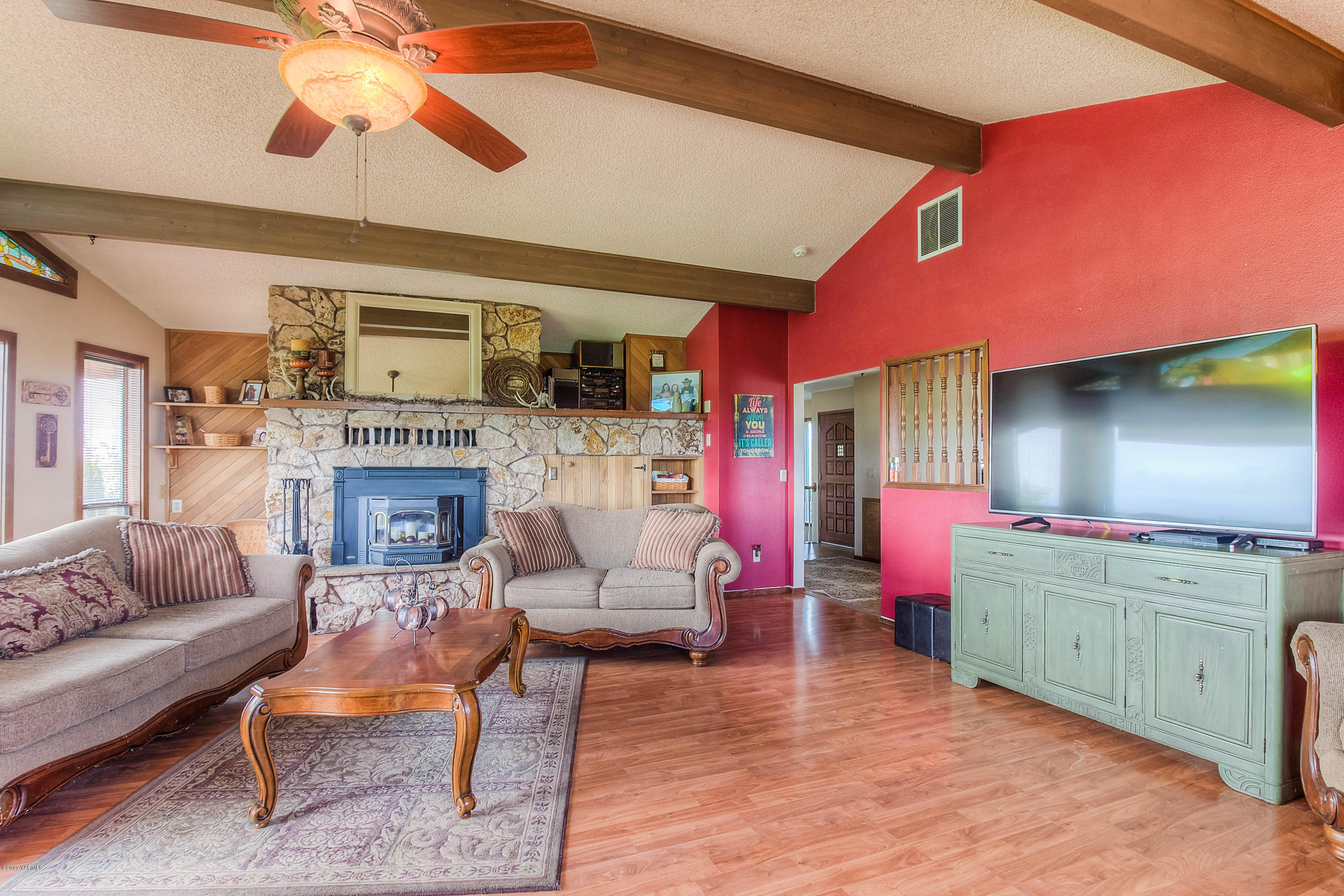 600 Cornue Road Zillah, WA 98953 - Photo 4 of 33 a living room with furniture and a fireplace