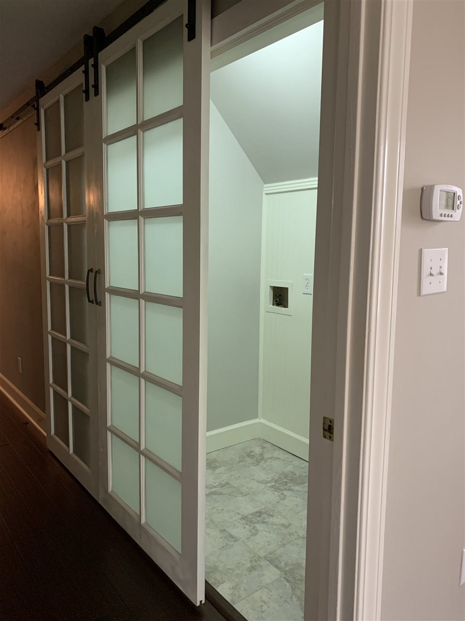 8800 Audley Circle Raleigh, NC 27615 - Photo 16 of 27 Barn Door to laundry area