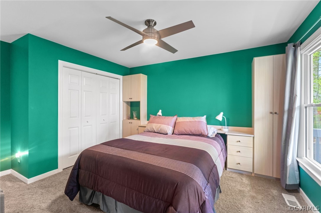 7106 Deer Thicket Drive Midlothian, VA 23112 - Photo 16 of 34 a bedroom with a bed and a large window