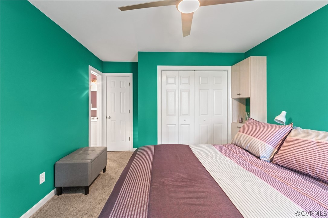 7106 Deer Thicket Drive Midlothian, VA 23112 - Photo 17 of 34 a bedroom with a bed furniture and a large window