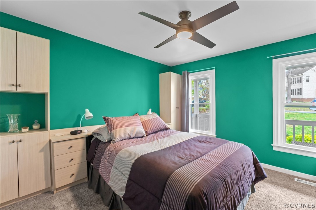 7106 Deer Thicket Drive Midlothian, VA 23112 - Photo 18 of 34 a bedroom with a bed and a window