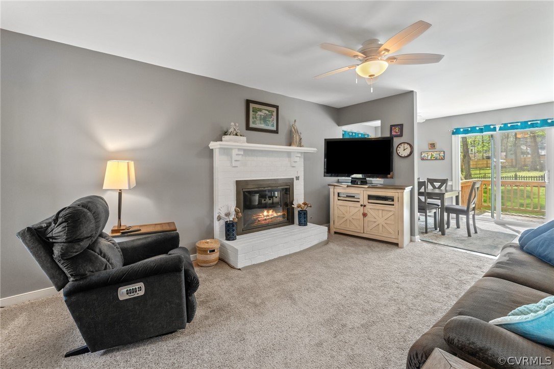 7106 Deer Thicket Drive Midlothian, VA 23112 - Photo 2 of 34 a living room with furniture and a flat screen tv