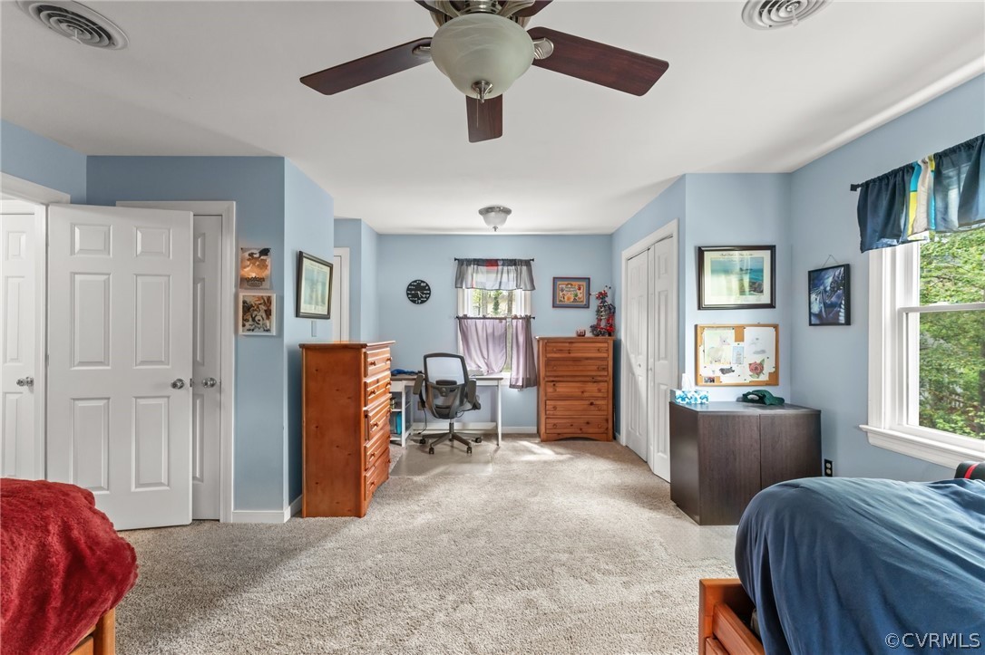 7106 Deer Thicket Drive Midlothian, VA 23112 - Photo 22 of 34 a bedroom with furniture and a window
