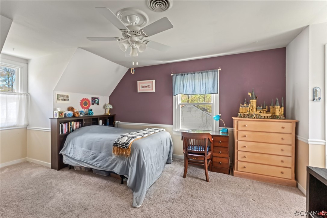 7106 Deer Thicket Drive Midlothian, VA 23112 - Photo 23 of 34 a bedroom with a bed and a chandelier