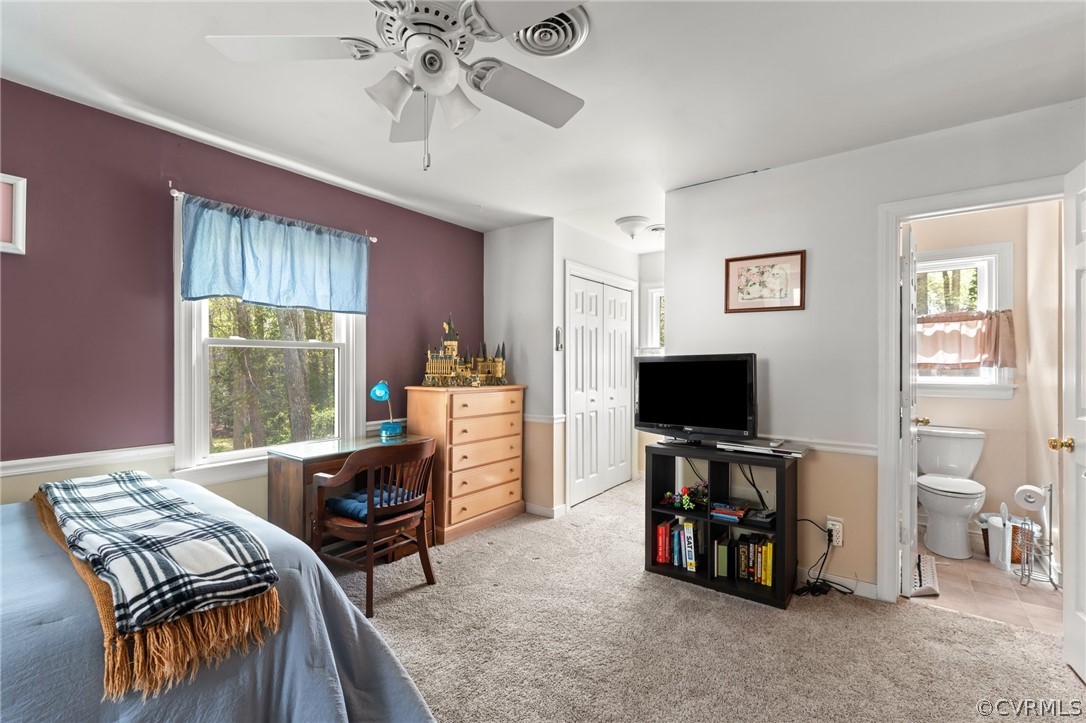 7106 Deer Thicket Drive Midlothian, VA 23112 - Photo 25 of 34 a living room with furniture and a flat screen tv