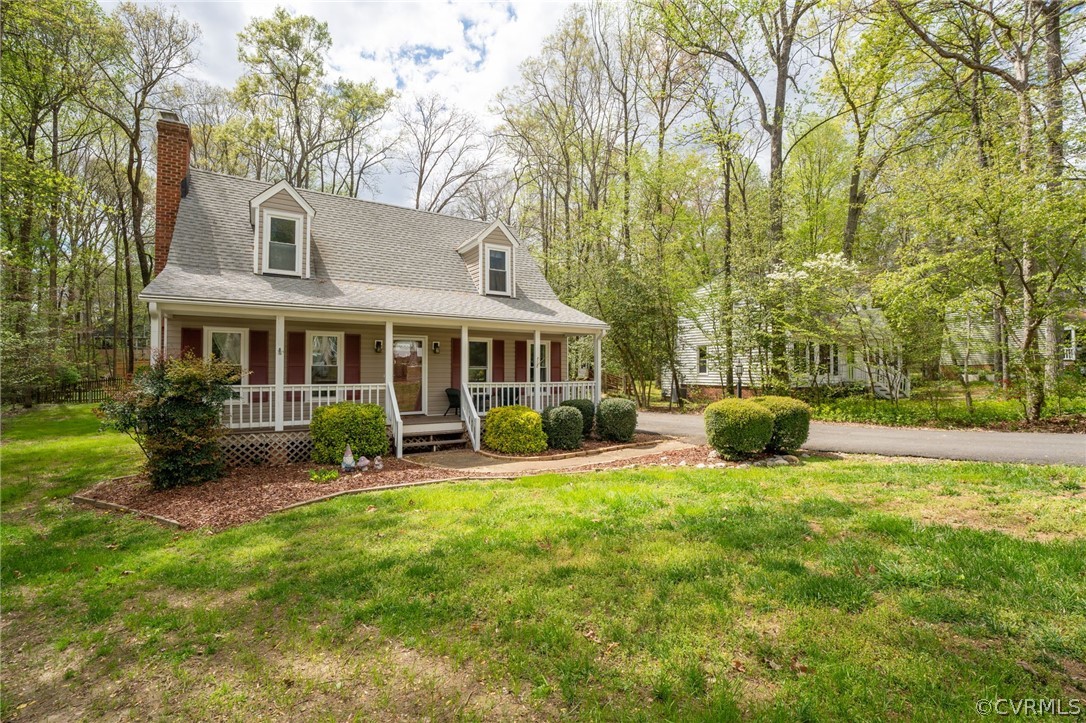 7106 Deer Thicket Drive Midlothian, VA 23112 - Photo 28 of 34 a view of a house with a yard and sitting area