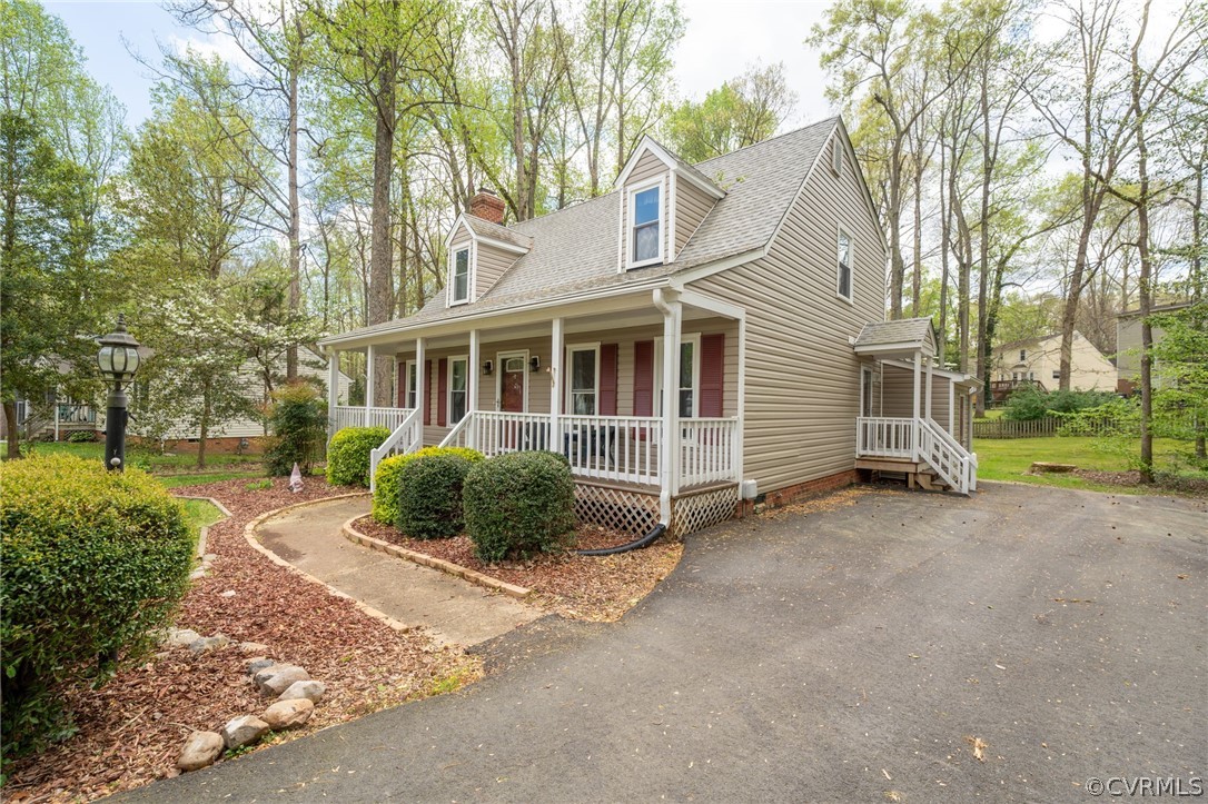 7106 Deer Thicket Drive Midlothian, VA 23112 - Photo 30 of 34 a view of a house with a garden