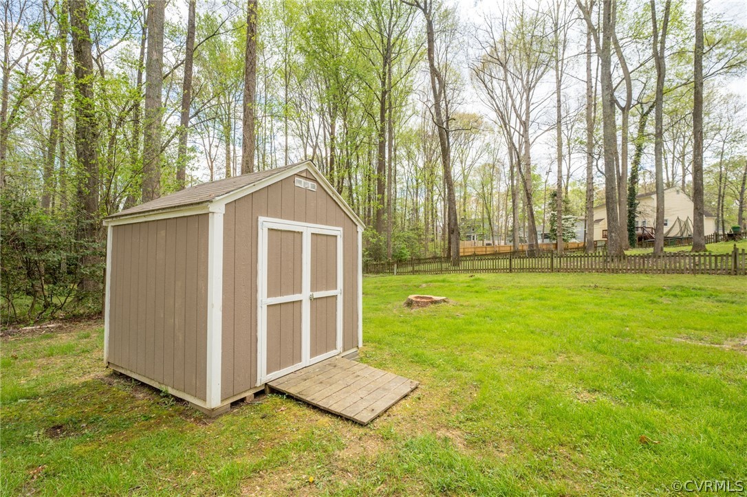 7106 Deer Thicket Drive Midlothian, VA 23112 - Photo 33 of 34 a front view of a house with garden