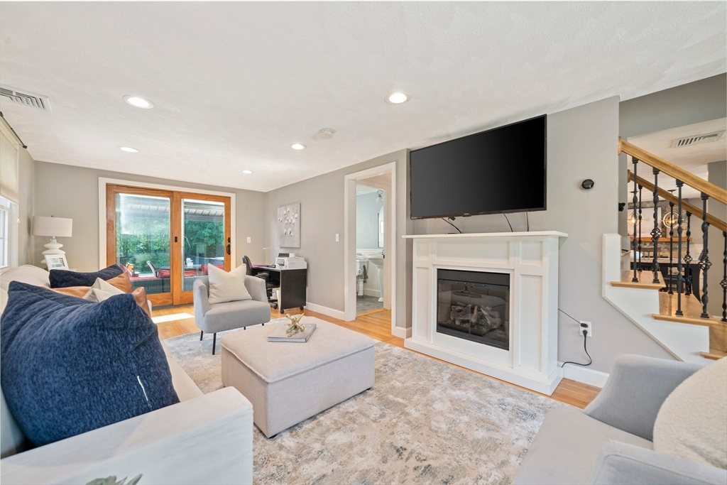 5 Kingsbury Road Canton, MA 02021 - Photo 11 of 39 a living room with fireplace furniture and a flat screen tv
