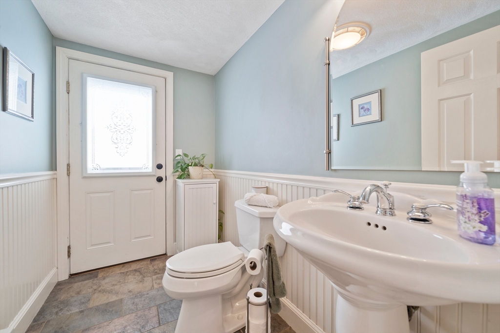 5 Kingsbury Road Canton, MA 02021 - Photo 12 of 39 a bathroom with a sink and a toilet