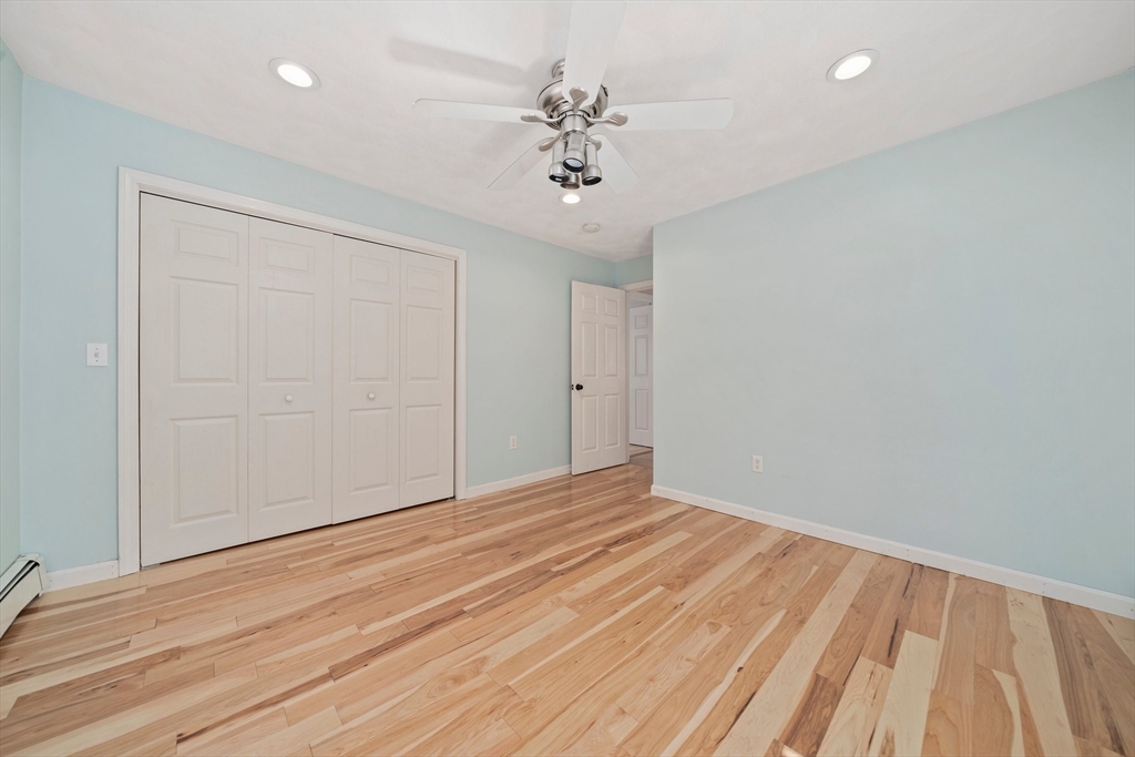 5 Kingsbury Road Canton, MA 02021 - Photo 21 of 39 wooden floor in an empty room with a window