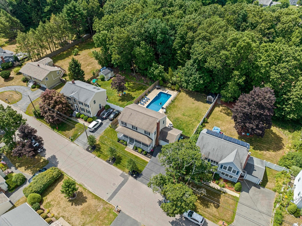 5 Kingsbury Road Canton, MA 02021 - Photo 36 of 39 an aerial view of a house with a garden and swimming pool