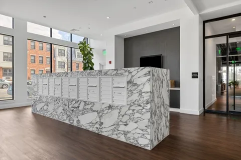 a view of entryway with wooden floor