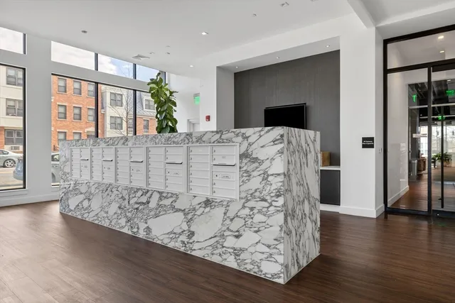 a view of entryway with wooden floor