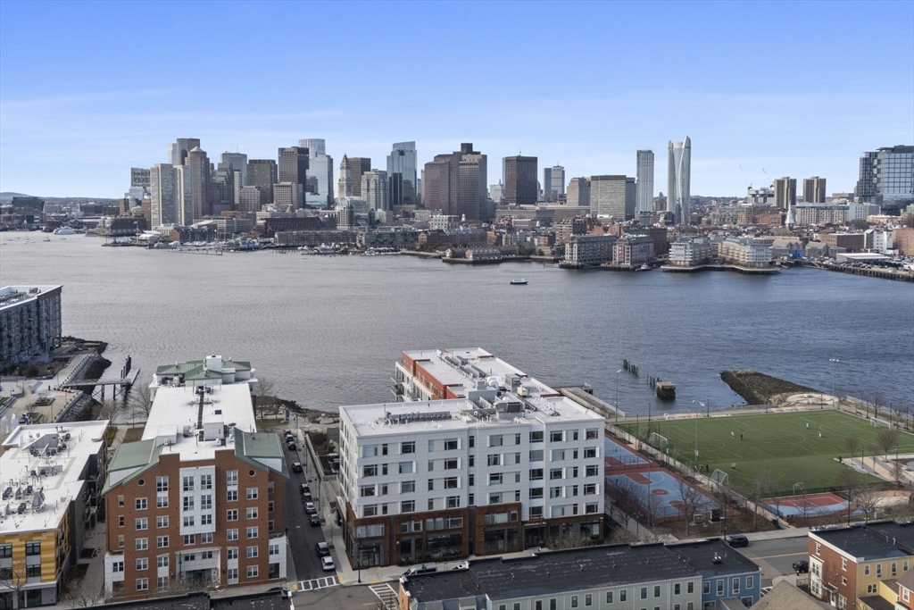99 Sumner Street, Unit 101 Boston, MA 02128 - Photo 32 of 35 a view of city with tall buildings