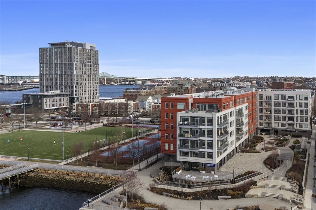 99 Sumner Street, Unit 101 Boston, MA 02128 - Photo 34 of 35 a view of a city with tall buildings
