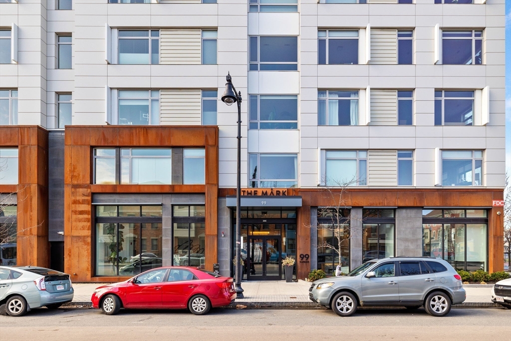 99 Sumner Street, Unit 101 Boston, MA 02128 - Photo 35 of 35 a car parked in front of a building