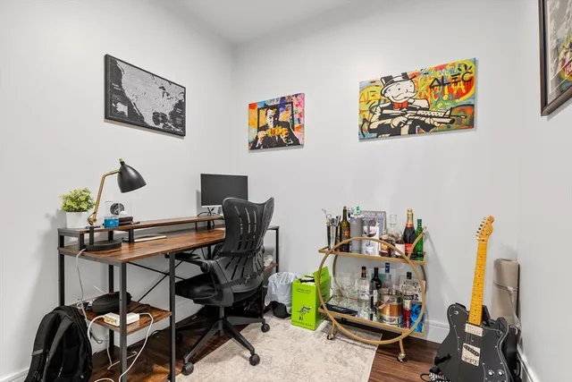 a view of a workspace with furniture