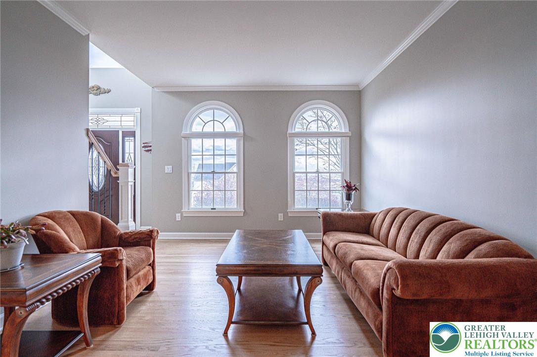 6551 Overlook Road Orefield, PA 18069 - Photo 17 of 82 a living room with furniture and a potted plant